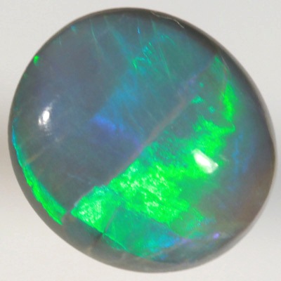 SOLID SEMI BLACK OPAL Bright green rolling flashes